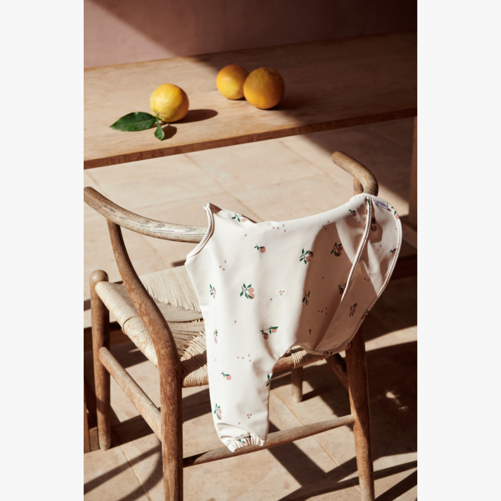 Liewood - Merle - Bavaglio per prime pappe impermeabile a maniche lunghe - Pesche