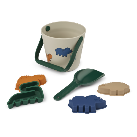 Liewood - Gilma - Set Spiaggia - Paletta secchiello e formine - Dinosauri