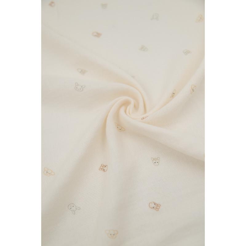 mussola color crema con animaletti