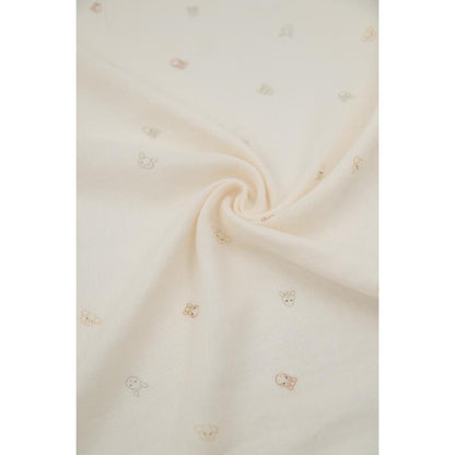 mussola color crema con animaletti