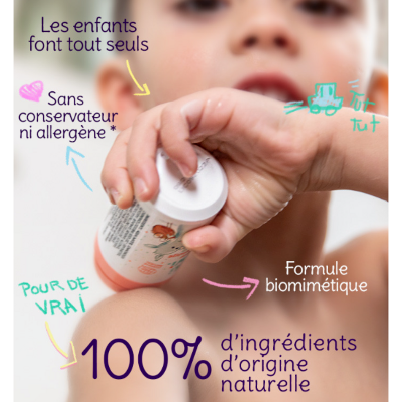 crema per bambini con roll e tappo che si svita bianco e arancione con. bimbo che la usa e scritte per spiegarne il funzionamento